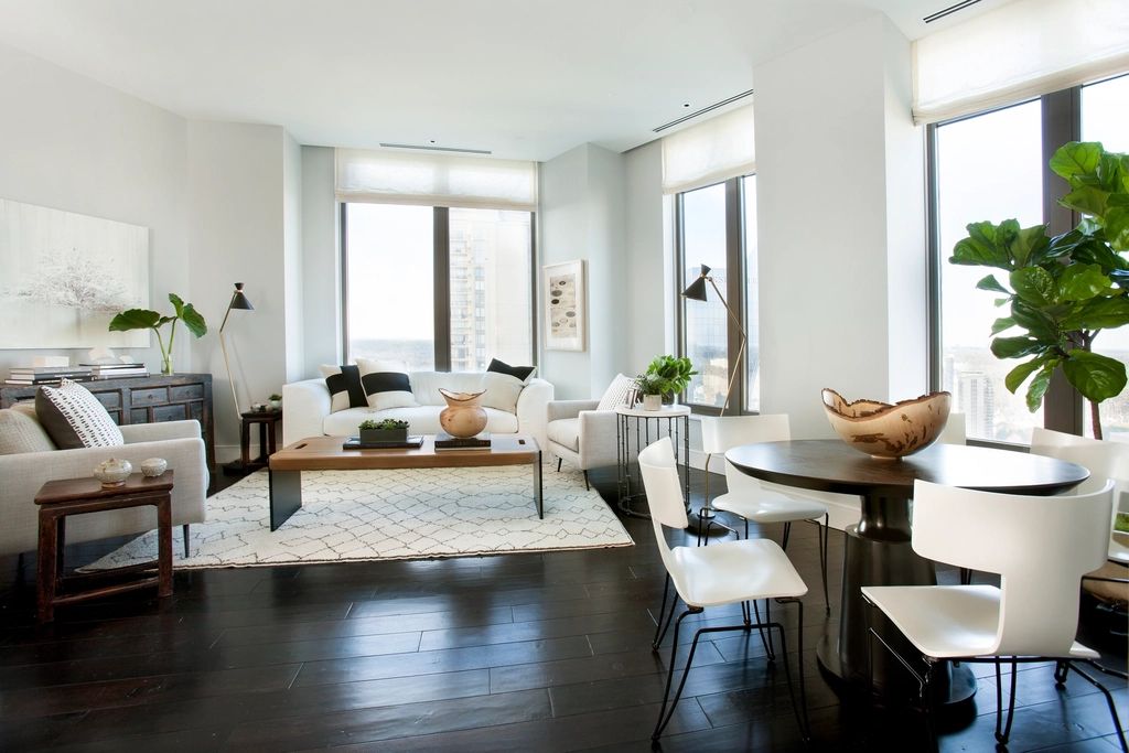 A suite sitting room with a sofa and armchairs